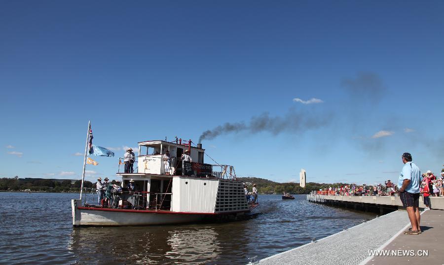 A steamship sails on Griffin Lake in Canberra, Australia, March 11, 2013. Canberra marked its 100th anniversary on Tuesday. (Xinhua/Qian Jun) 