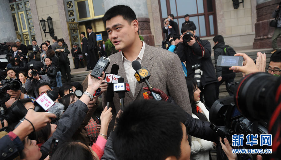 Yao Ming, member of the 12th National Committee of the Chinese People's Political Consultative Conference (CPPCC) receives an interview with reporters when he leaves the Great Hall of the People. The closing meeting of the first session of the 12th National Committee of the Chinese People's Political Consultative Conference (CPPCC) was held at the Great Hall of the People in Beijing, capital of China, March 12, 2013. (Xinhua News Agency/Zhai Zihe)
