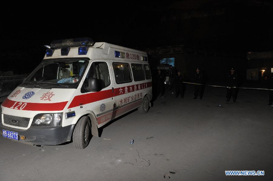 Photo taken on March 13, 2013 shows an ambulance at the site of the accident in Shuicheng County, southwest China's Guizhou Province. Twenty-one miners were killed and four others were missing in a coal and gas outburst Tuesday evening at Machang Coal Mine which belongs to Gemudi Company of Guizhou Water & Mining Group. Eighty-three miners were working underground when the accident took place, and 58 of them managed to get to the ground safely. (Xinhua/Ou Dongqu)