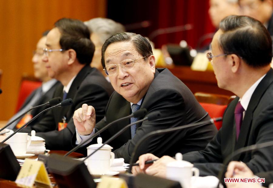 Yu Zhengsheng, a member of the Standing Committee of the Political Bureau of the Communist Party of China (CPC) Central Committee, who is also chairman of the 12th National Committee of the Chinese People's Political Consultative Conference (CPPCC), presides over the closing meeting of the first conference of the Standing Committee of the 12th CPPCC National Committee in Beijing, capital of China, March 13, 2013. (Xinhua/Ju Peng) 