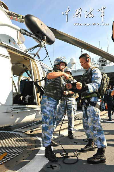 The 14th escort taskforce of the Navy of the Chinese People's Liberation Army (PLA) participates in an anti-hijack exercise on the March 10, 2013, local time, while sailing in the Arabian Sea area on the voyage to the Gulf of Aden. (navy.81.cn/Wang Changsong, Li Ding)