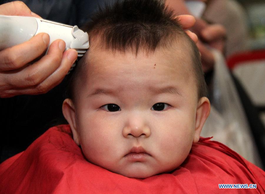 Faces Of Chinese Children Get New Year S First Haircut