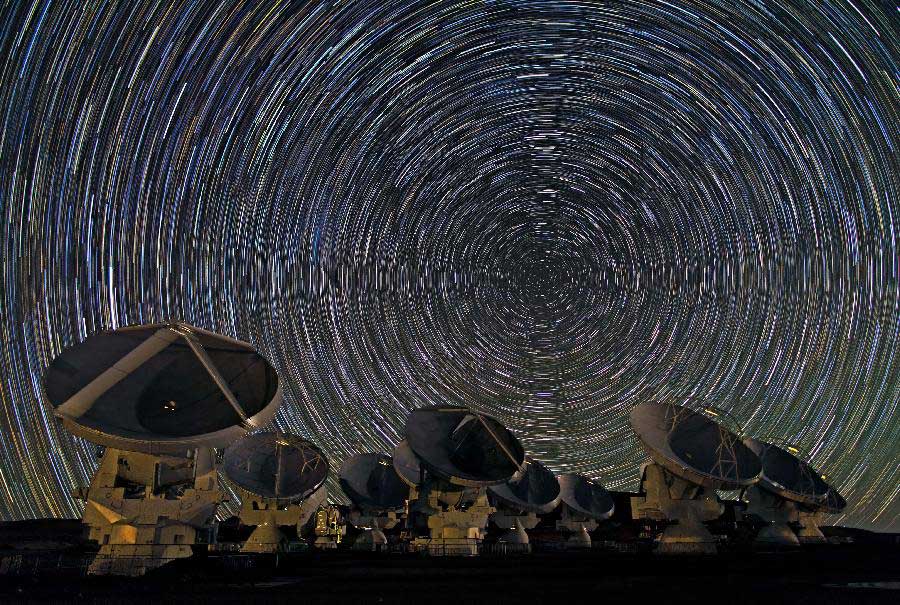 Image provided by the European Southern Observatory (ESO) on March 12, 2013, shows antennas of the Atacama Large Millimetre/Submillimetre Array (ALMA) project which aims to develop a telescope without parallel in the world. ALMA project is an international astronomical facility located 5,000 meters above Andes' El Llano de Chajnantor's plateau, some 50 km of San Pedro de Atacama in Chile's Second Region, in Antofagasta. The ALMA, an international partnership project between Europe, Japan and the United States, with the cooperation of Chile, is presently the largest astronomical project in the world and it will be inaugurated in Chile on March 13, 2013 to celebrate his transformation from a construction project to an observatory. (Xinhua/ESO)  