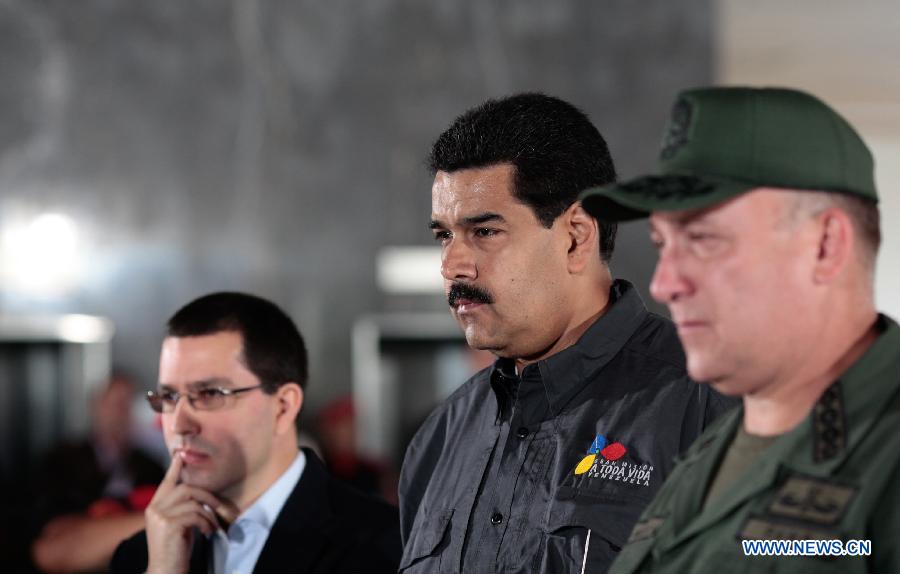 Image provided by Venezuela's Presidency shows Venezuela's acting President Nicolas Maduro (C) visiting the military high command in Caracas, capital of Venezuela, on March 13, 2013. (Xinhua) 