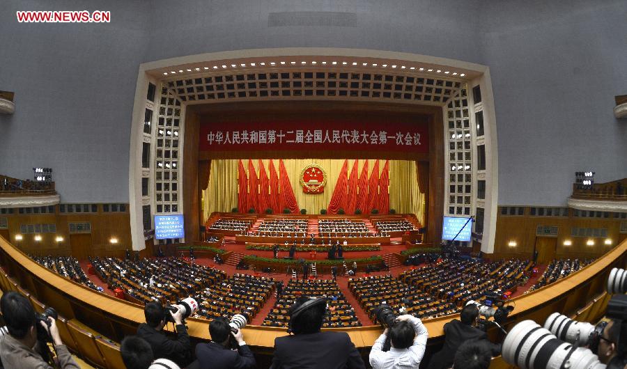 The fourth plenary meeting of the first session of the 12th National People's Congress (NPC) is held at the Great Hall of the People in Beijing, capital of China, March 14, 2013. Chairman, vice-chairpersons, secretary-general and members of the 12th NPC Standing Committee, president and vice-president of the state, and chairman of the Central Military Commission of the People's Republic of China will be elected here on Thursday. (Xinhua/Wang Peng)