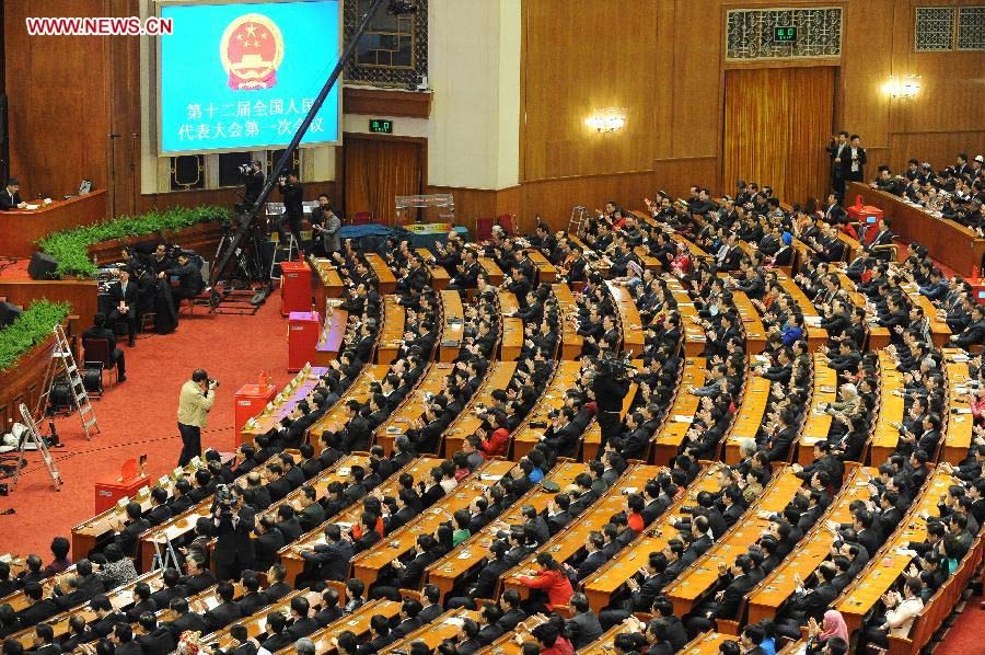 The fourth plenary meeting of the first session of the 12th National People's Congress (NPC) is held at the Great Hall of the People in Beijing, capital of China, March 14, 2013. Chairman, vice-chairpersons, secretary-general and members of the 12th NPC Standing Committee, president and vice-president of the state, and chairman of the Central Military Commission of the People's Republic of China will be elected here on Thursday. (Xinhua/Yang Zongyou)