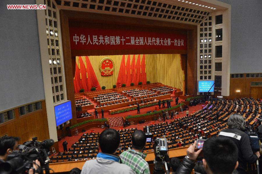 The fourth plenary meeting of the first session of the 12th National People's Congress (NPC) is held at the Great Hall of the People in Beijing, capital of China, March 14, 2013. Chairman, vice-chairpersons, secretary-general and members of the 12th NPC Standing Committee, president and vice-president of the state, and chairman of the Central Military Commission of the People's Republic of China will be elected here on Thursday. (Xinhua/Wang Song)