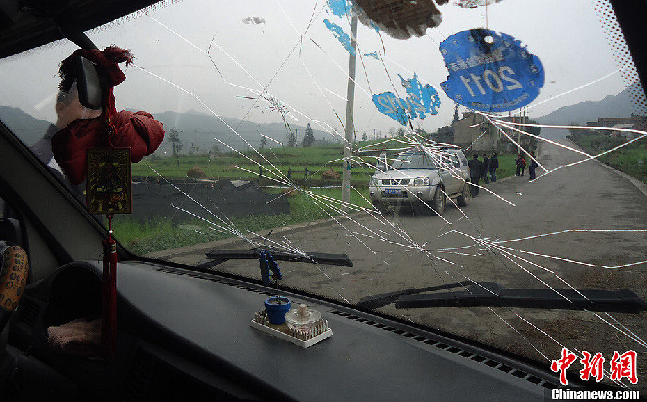 The most severe hail for centuries hits Guiding county in southwest China's Guizhou province on March 12, 2013. It has caused a direct economic loss of 14.73 million yuan. The strong hail lasted for about 30 minutes. The hailstones measured between 3 and 4 centimeters in diameter, with the biggest ones being 7 centimeters. Five villages were affected, with houses, crops, living facilities, forests damaged in varying degrees. (Chinanews/Chen Guangfei)