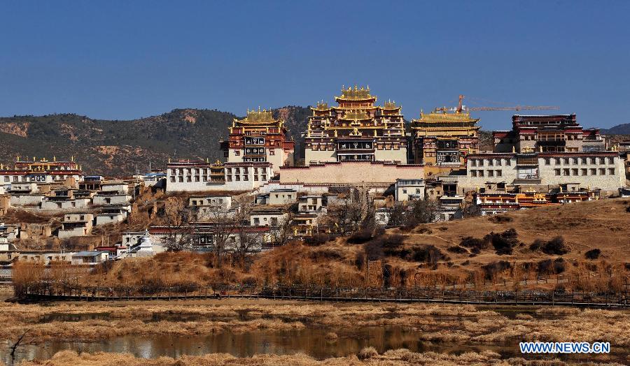 Photo taken on March 14, 2013 shows the Ganden Stumtseling Monastery, the largest Tibetan Buddhism temple in Yunnan Province, in Shangri-la County, southwest China's Yunnan Province. (Xinhua/Lin Yiguang) 