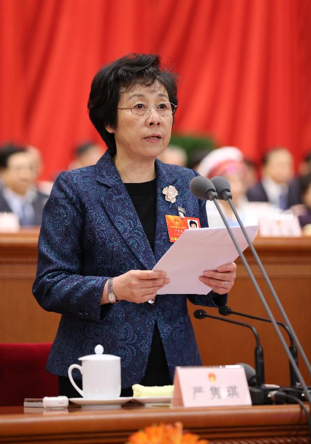 Yan Junqi presides over the fifth plenary meeting of the first session of the 12th National People's Congress (NPC) at the Great Hall of the People in Beijing, capital of China, March 15, 2013. The meeting will vote to decide on the premier, as well as vice chairpersons and members of the Central Military Commission of the People's Republic of China. President of the Supreme People's Court and procurator-general of the Supreme People's Procuratorate will also be elected. (Xinhua/Lan Hongguang)