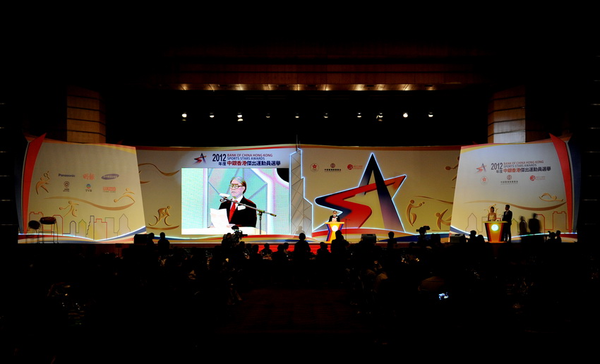 Timothy Fok, President of the Sports Federation and Olympic Committee of Hong Kong, delivers a speech at the in the awards presentation ceremony at the Hong Kong Convention and Exhibition Centre on March 14, 2013. (Xinhua/Lu Binghui)