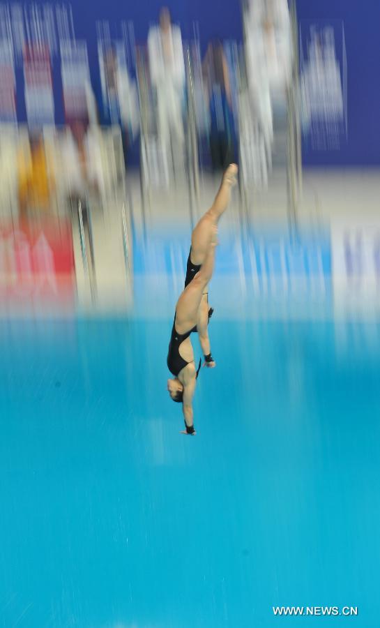 Meaghan Benfeito and Roseline Filion of Canada compete during the women's 10m Platform Synchro Final in the FINA Diving World Series 2013-Beijing at the National Aquatics Center in Beijing, China, Match 15, 2013. Meaghan Benfeito and Roseline Filion won the silver medal with 316.71 points. (Xinhua/Jia Yuchen)