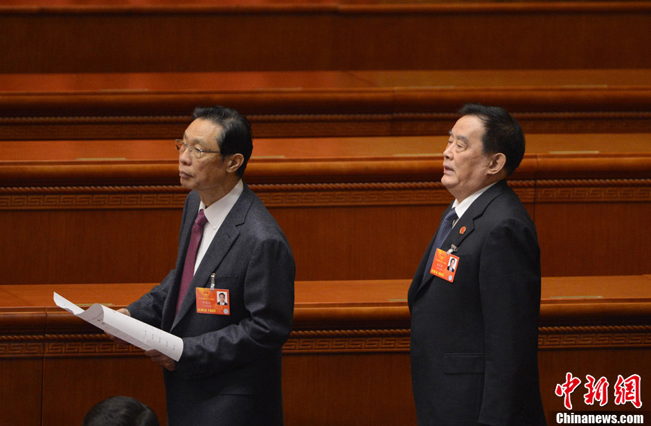 Photo shows Railways Minister Sheng Guangzu and Zhong Nanshan, an academician known for his work combating the Severe Acute Respiratory Syndrome (SARS) attend the 4th plenary meeting of the first session of the 12th National People’s Congress on March 14, 2013. (Chinanews.com/ Liao Pan)