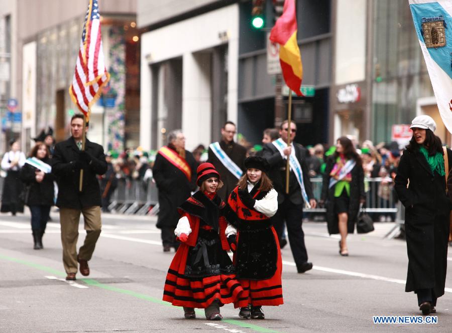 Parade participants march along the 5th Ave during the 252nd annual St. Patrick's Day Parade in New York City on March 16, 2013. (Xinhua/Zhai Xi) 