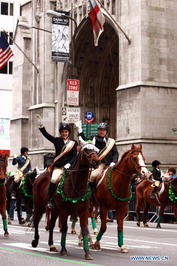 Parade participants march along the 5th Ave during the 252nd annual St. Patrick's Day Parade in New York City on March 16, 2013. (Xinhua/Zhai Xi) 