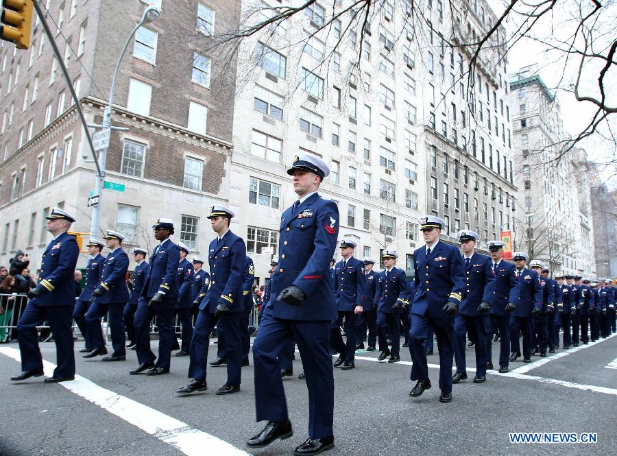 Parade participants march along the 5th Ave during the 252nd annual St. Patrick's Day Parade in New York City on March 16, 2013. (Xinhua/Cheng Li) 