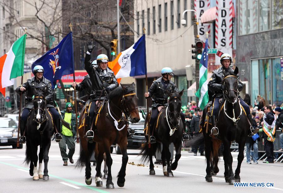 Parade participants march along the 5th Ave during the 252nd annual St. Patrick's Day Parade in New York City on March 16, 2013. (Xinhua/Cheng Li) 