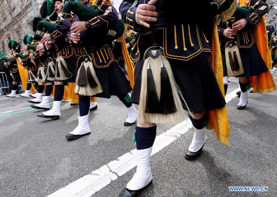 Parade participants march along the 5th Ave during the 252nd annual St. Patrick's Day Parade in New York City on March 16, 2013. (Xinhua/Cheng Li) 