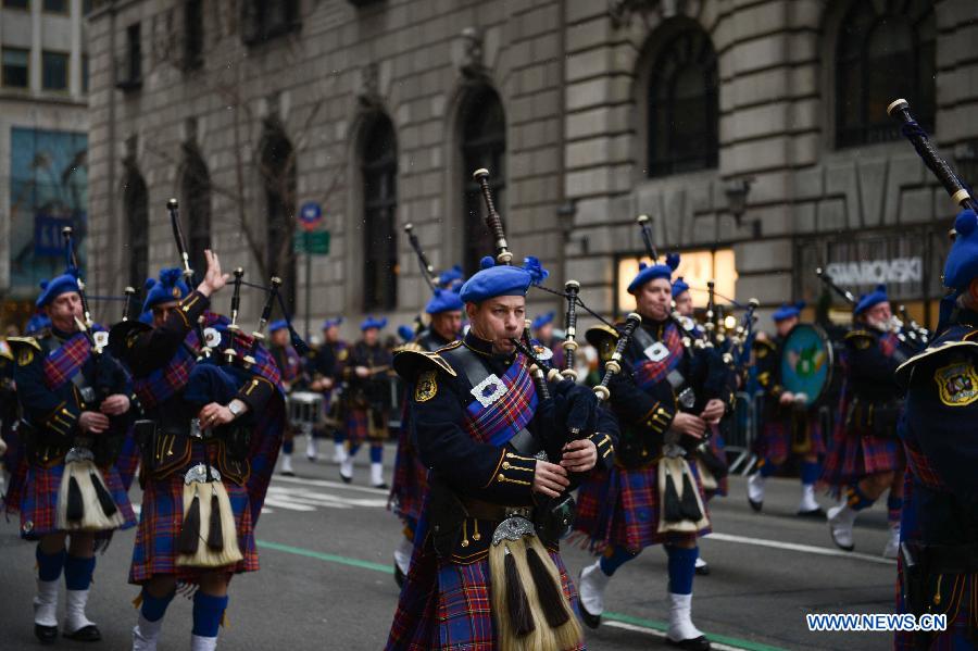 Participants of the 252nd St. Patrick's Day parade march along the Fifth Avenue in New York City, on March 16, 2013. St. Patrick's Day is widely observed in the United States as a celebration of the Irish and Irish American culture. (Xinhua/Niu Xiaolei) 