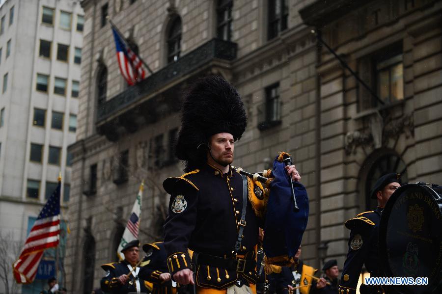 Participants of the 252nd St. Patrick's Day parade march along the Fifth Avenue in New York City, on March 16, 2013. St. Patrick's Day is widely observed in the United States as a celebration of the Irish and Irish American culture. (Xinhua/Niu Xiaolei) 