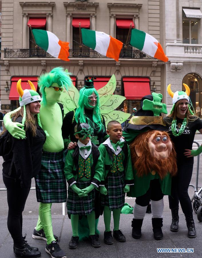 Revellers pose during the 252nd annual St. Patrick's Day Parade in New York City on March 16, 2013. (Xinhua/Zheng Xiaoning) 
