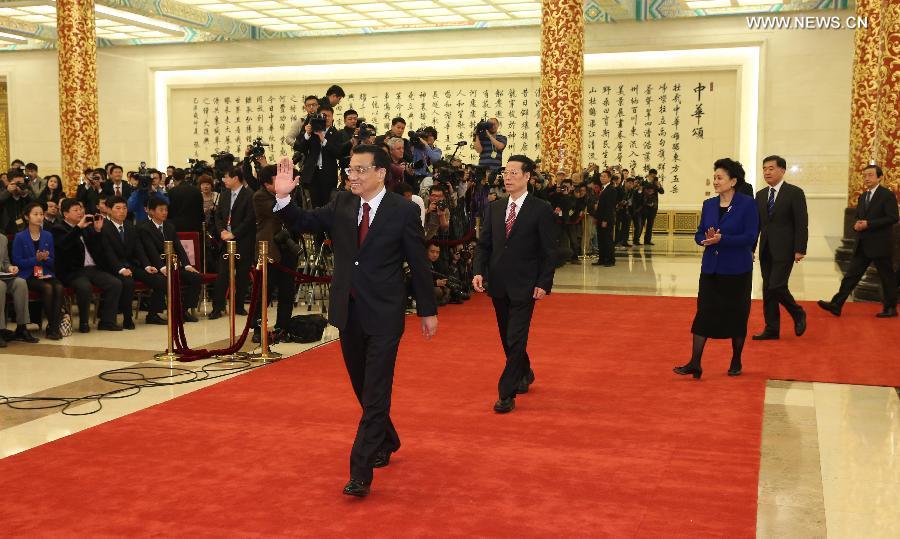 Chinese Premier Li Keqiang and vice premiers Zhang Gaoli, Liu Yandong, Wang Yang and Ma Kai arrive at a press conference after the closing meeting of the first session of the 12th National People's Congress (NPC) at the Great Hall of the People in Beijing, capital of China, March 17, 2013. Chinese Premier Li Keqiang and Vice Premiers Zhang Gaoli, Liu Yandong, Wang Yang and Ma Kai met the press and answered questions here on Sunday. (Xinhua/Pang Xinglei)