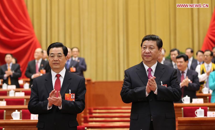 Xi Jinping (R) and Hu Jintao attend the closing meeting of the first session of the 12th National People's Congress (NPC) at the Great Hall of the People in Beijing, capital of China, March 17, 2013. (Xinhua/Lan Hongguang)