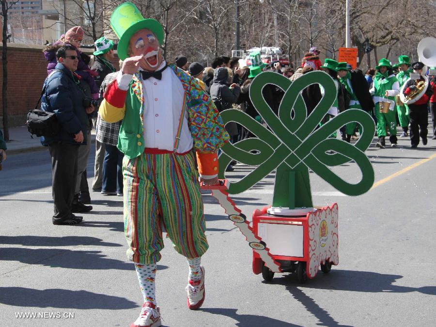 A reveler takes part in the annual St. Patrick's Day Parade in Toronto, March 17, 2013. (Xinhua/Zhang Ziqian)