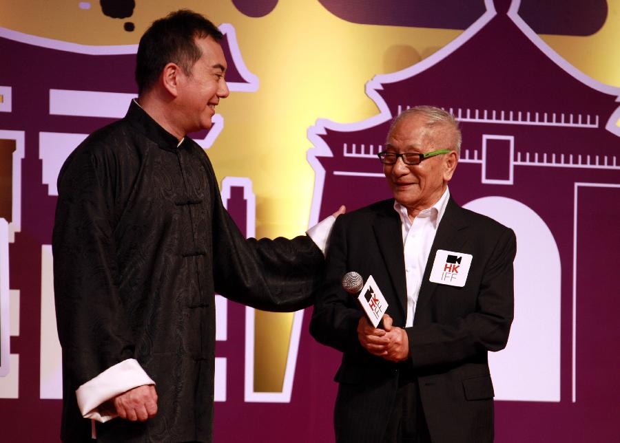 Anthony Wong Chau Sang (L), who starred in the martial art movie "Ip Man: the Final Fight", attends the inauguration ceremony of the 37th Hong Kong International Film Festival (HKIFF) along with martial artist Ip Man's son Ip Chun, who himself is an heir to the Wing Chun martial art, in south China's Hong Kong, March 17, 2013. The 37th HKIFF was inaugurated Sunday at the Hong Kong Convention and Exhibition Center. More than 300 film productions from 68 countries and regions will be showcased during the film festival. (Xinhua/Jin Yi)