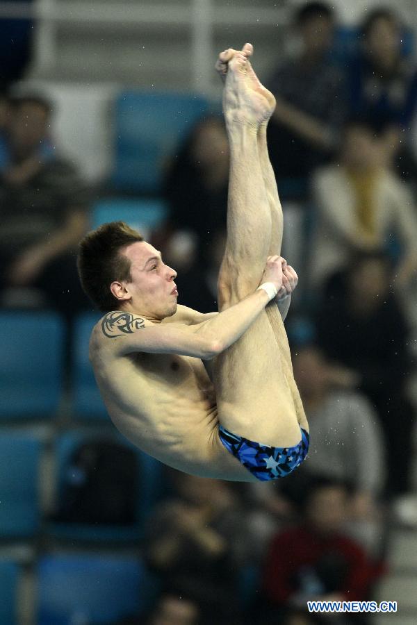 Minibaev Victor of Russia competes during the Men's 10m platform final at the FINA Diving World Series 2013 held at the Aquatics Center in Beijing, capital of China, on March 17, 2013. Minibaev Victor won the bronze medal with 499.35 points. (Xinhua/Li Jundong)