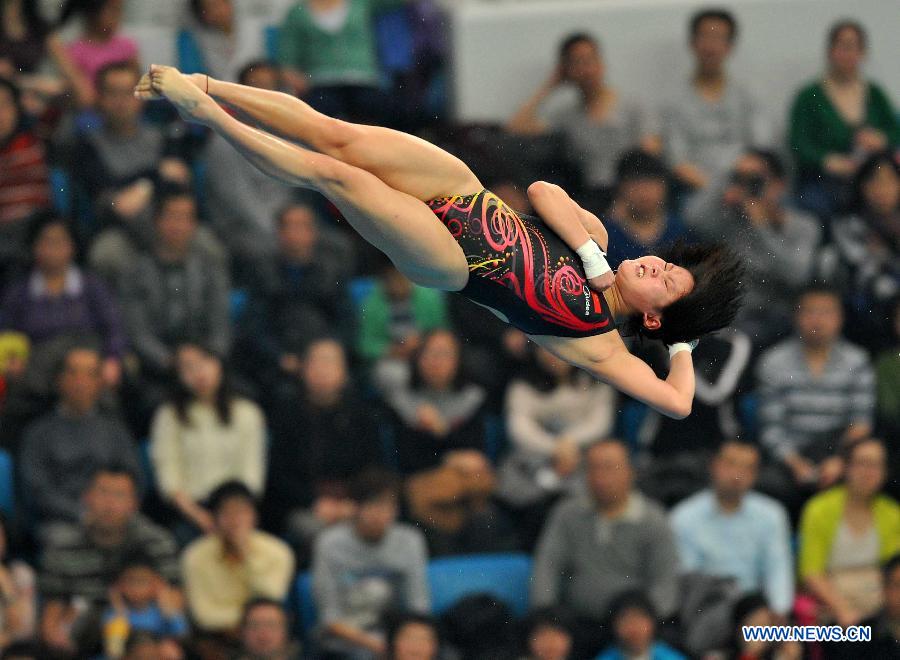 Chen Ruolin of China competes during the Women's 10m platform final at the FINA Diving World Series 2013 held at the Aquatics Center, in Beijing, capital of China, on March 17, 2013. Chen Ruolin claimed the title with 403.75 points. (Xinhua/Gong Lei)