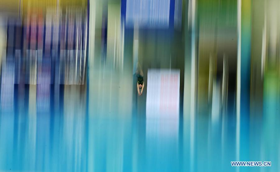 Melissa Wu of Australia competes during the Women's 10m platform final at the FINA Diving World Series 2013 held at the Aquatics Center in Beijing, capital of China, on March 17, 2013. Wu Melissa ranked 5th with 305.55 points. (Xinhua/Fei Maohua)