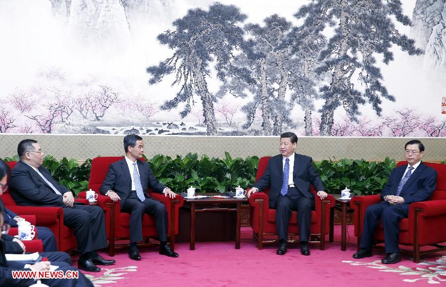 Chinese President Xi Jinping (2nd R) meets with CY Leung (2nd L), chief executive of Hong Kong Special Administrative Region, and Chui Sai On (1st L), chief executive of Macao Special Administrative Region, in Beijing, capital of China, March 18, 2013. (Xinhua/Ju Peng) 