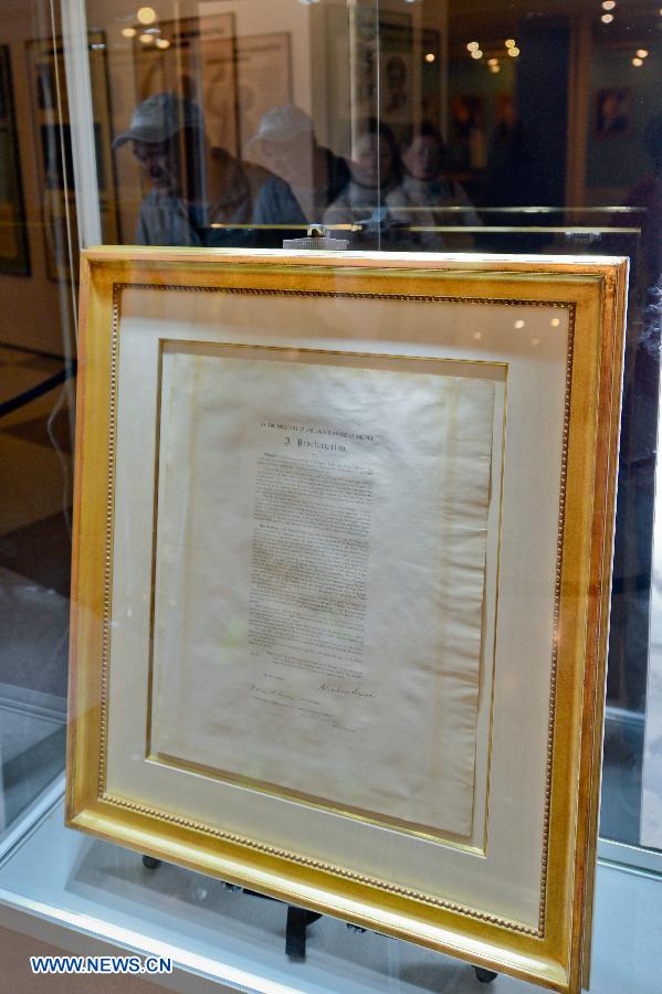 The original copy of the Emancipation Proclamation signed by Abraham Lincoln is on display during an exhibition commemorating the abolishment of slavery, at the United Nations (UN) headquarters in New York, on March 18, 2013. Beginning on Monday, the UN will be hosting a week of activities to highlight the significance of March 25, the International Day of Remembrance of the Victims and the Transatlantic Slave Trade. (Xinhua/Niu Xiaolei)