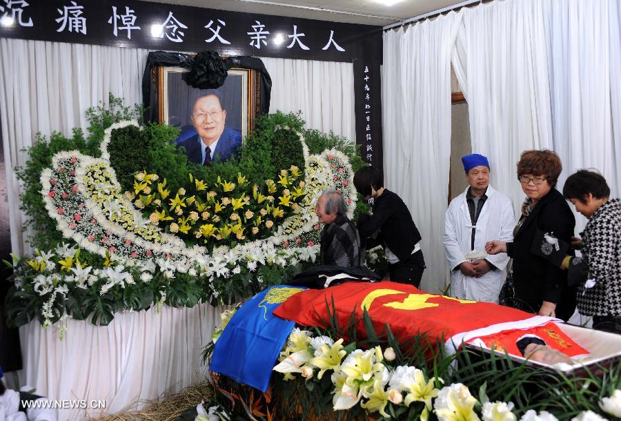 Villagers and representatives of all circles express condolence to the death of Wu Renbao, the retired Communist Party of China (CPC) chief of Huaxi Village, at the mourning hall in Huaxi Village of Jiangyin City, east China's Jiangsu Province, March 19, 2013. Wu, 85, died of cancer on Monday at his home in the village, which is one of the richest villages in the country. Renowned as China's most eminent farmer, Wu worked hard over the past decades to lead his villagers in striving for common wealth, an ideal regarded as one of the core principles of socialism. (Xinhua/Sun Can) 