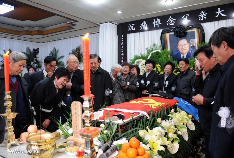 Villagers express condolence to the death of Wu Renbao, the retired Communist Party of China (CPC) chief of Huaxi Village, at the mourning hall in Huaxi Village of Jiangyin City, east China's Jiangsu Province, March 19, 2013. Wu, 85, died of cancer on Monday at his home in the village, which is one of the richest villages in the country. Renowned as China's most eminent farmer, Wu worked hard over the past decades to lead his villagers in striving for common wealth, an ideal regarded as one of the core principles of socialism. (Xinhua/Sun Can)  