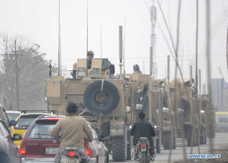 U.S. soldiers on their military vehicles patrol in the city of Kabul, capital of Afghanistan, on March 19, 2013. (Xinhua/Ahmad Massoud) 