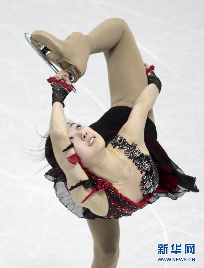 Li Zijun performs in the competition on March 14, 2013. Li Zijun, Chinese contestant, placed twelfth in the short program with a score of 56.31 point at 2013 World Figure Skating Championship in Canada. (Xinhua/Reuters) 