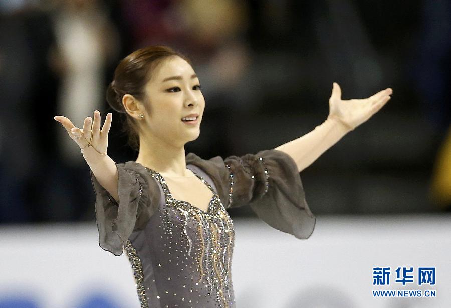 Yuna Kim is in the free skating program on March 16, 2013. Yuna Kim, Korean contestant, placed first in the short program with a total score of 218.31 at the 2013 World Figure Skating Championship in Canada. (Xinhua/Reuters)