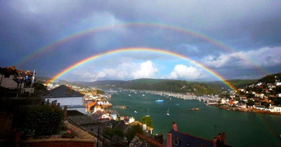 A double rainbow hangs on the sky of Dartmouth, Devon, UK. The British photographer has spent seven years for this moment. He had taken more than 2,000 similar photos before he successfully captured the perfect moment of the double rainbow.(file photo)
