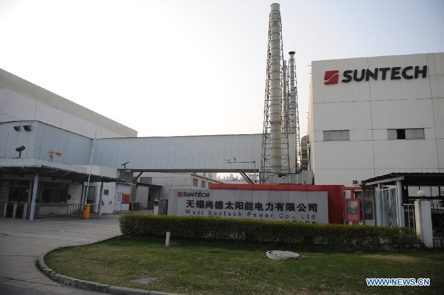 Photo taken on March 17, 2013 shows the entrance of a Suntech Power factory in Wuxi, east China's Jiangsu Province. China's leading solar panel maker Suntech Power, a New York-listed private company based in Wuxi, declared bankruptcy on Wednesday. (Xinhua/Shen Peng) 