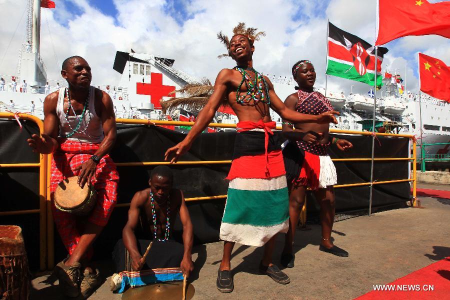 Locals in Mombasa sing and dance to see off Chinese Navy hospital ship Peace Ark on Oct. 18, 2010. The China-Africa strategic cooperation has created a promising win-win scenario for the world's largest developing country and the fast-emerging continent over past decades. Chinese President Xi Jinping will visit Tanzania, South Africa and the Republic of Congo later this month and attend the fifth BRICS summit on March 26-27 in Durban, South Africa. (Xinhua/Zha Chunming) 