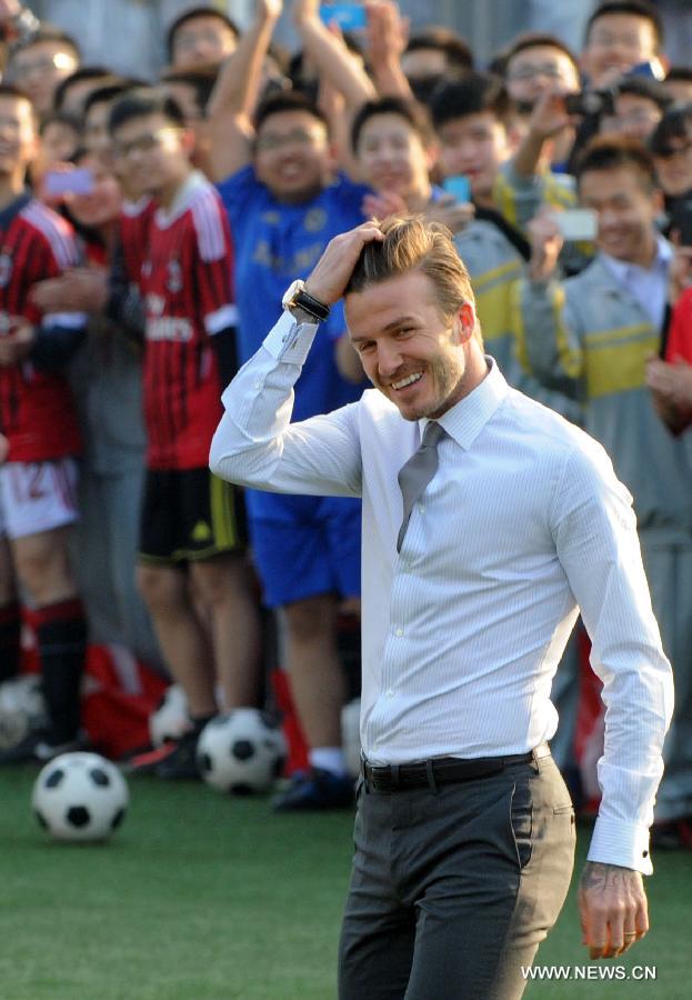 Beckham in Beijing, playing football in suits (6)