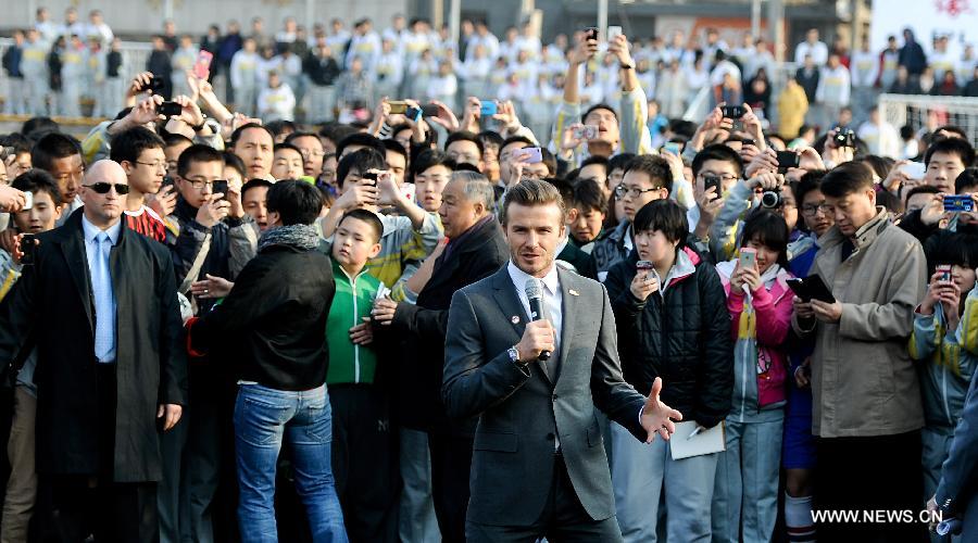 Beckham in Beijing, playing football in suits (7)