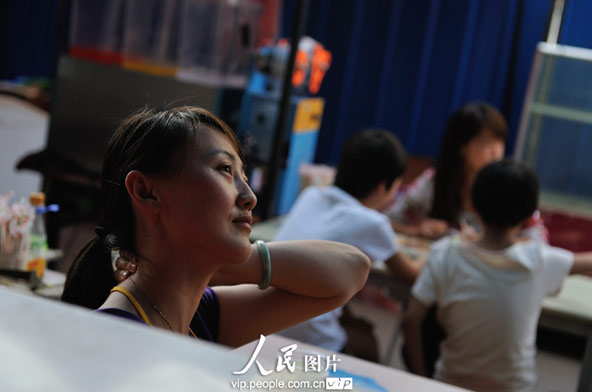 Before opening the restaurant, Li opened a Yoga center. She said that beijing capable to combine the career with the interests was a very happy thing. (photo/vip.peolpe.com.cn)