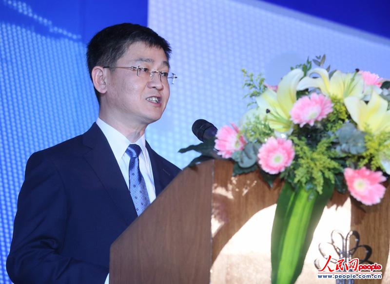 Liao Hong, president and editor-in-chief of People.cn Co., Ltd addresses the opening ceremony, March 19, 2013. （Mai Runtian）