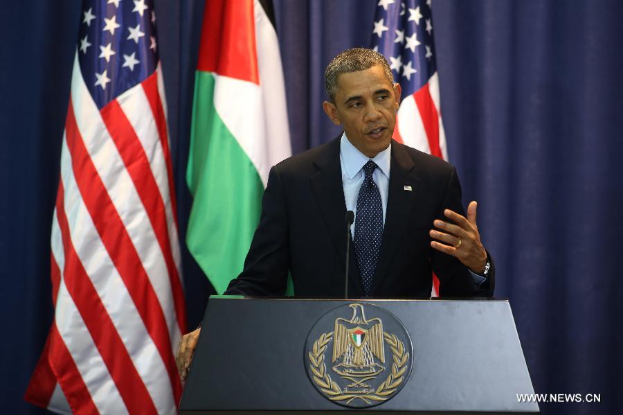 U.S. President Barack Obama speaks during a joint press conference with his Palestinian counterpart Mahmoud Abbas in the West Bank city of Ramallah on March 21, 2013. Obama arrived in Tel Aviv in Israel Wednesday to start his Mideast tour. Obama will spend three days in Israel, the Palestinian territories and Jordan. (Xinhua/POOL/Fadi Arouri)