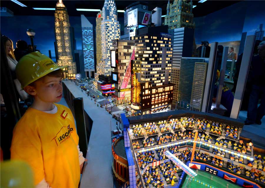 Guests visit the LEGO MINILAND of Manhattan's iconic landmarks that have been reconstructed from nearly one million LEGO bricks at LEGOLAND® Discovery Center in Westchester, New York, the United States, on March 21, 2013. The newly-built LEGOLAND® Discovery Center will open on March 27. (Xinhua Photo) 