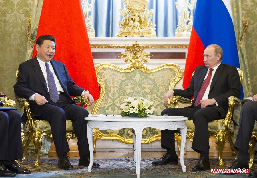 Chinese President Xi Jinping (L) meets with Russian President Vladimir Putin, in Moscow, capital of Russia, March 22, 2013. (Xinhua/Huang Jingwen) 