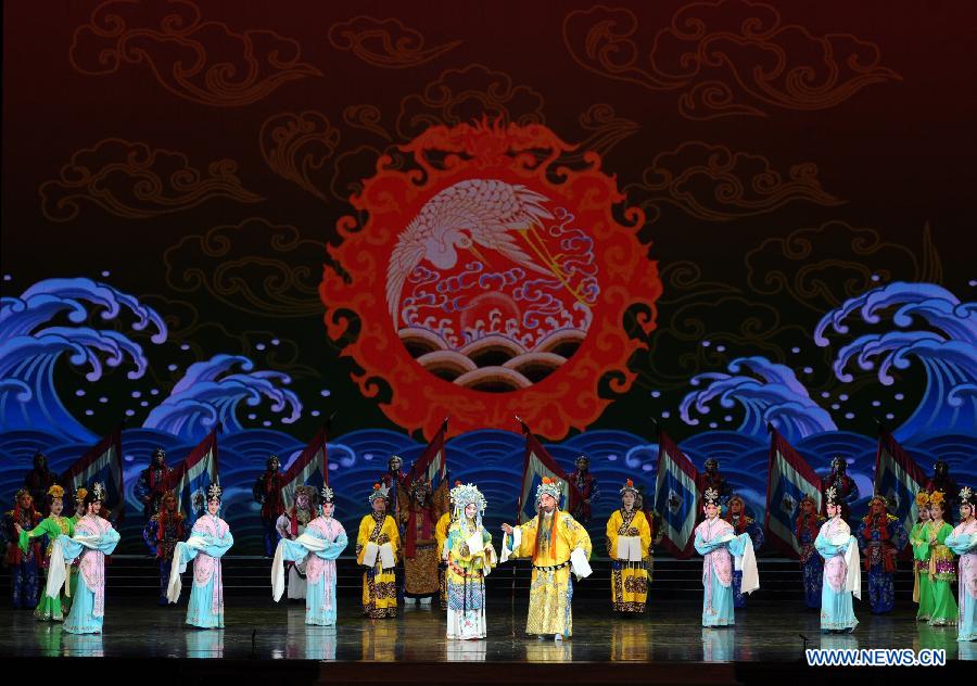 Artists perform during the opening ceremony of the "Tourism Year of China" in Moscow, March 22, 2013. The "China-Russia Tourism Year" program, which began last year with the "Tourism Year of Russia" in China, aims to foster tourism ties and humanistic exchanges between the two countries. (Xinhua/Jiang Kehong)